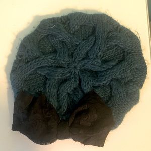 Turquoise blue beanie hat with black lace bow